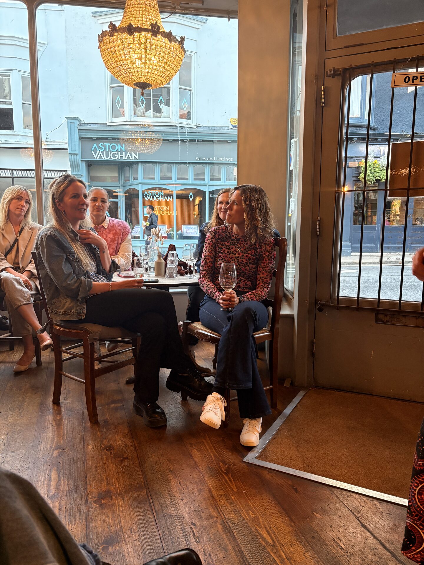 Guests chatting by the window